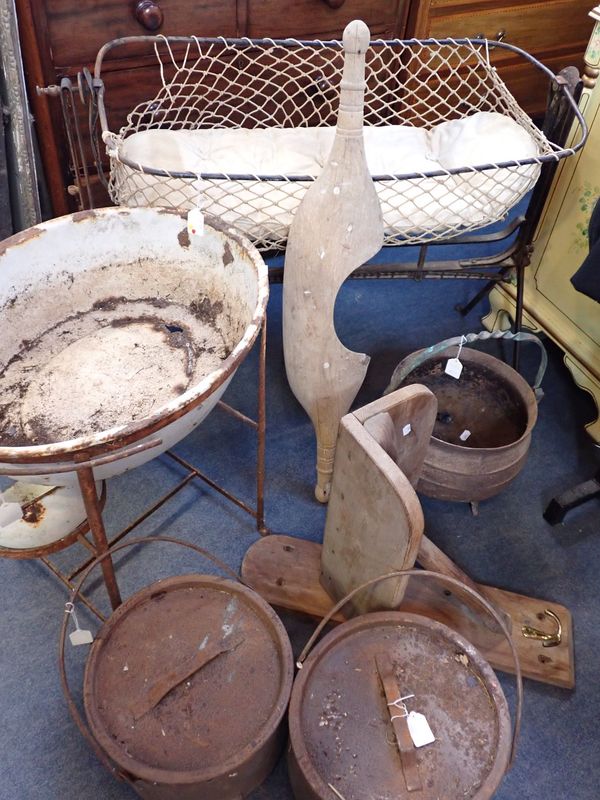 A VICTORIAN IRON FOLDING COT, AN IRON CAULDRON