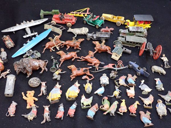 A COLLECTION OF CAST METAL TOYS