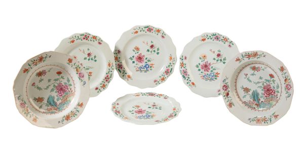 A SET OF FOUR CHINESE FAMILLE ROSE PLATES