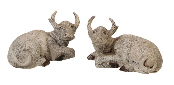 A PAIR OF CHINESE BISCUIT MODELS OF OXEN