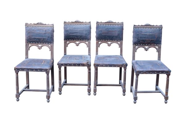 A SET OF FOUR OAK GOTHIC REVIVAL DINING CHAIRS