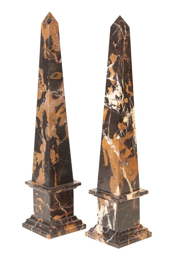 A PAIR OF PORTORO MARBLE OBELISKS