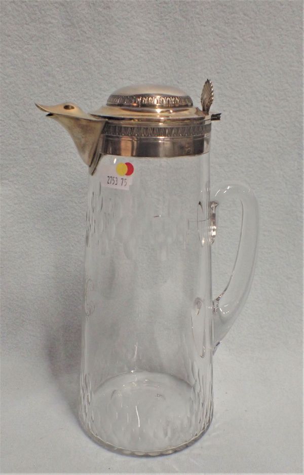 A CONTINENTAL SILVER MOUNTED WATER JUG