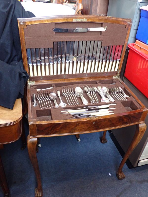 A WALNUT CASED CANTEEN OF CUTLERY