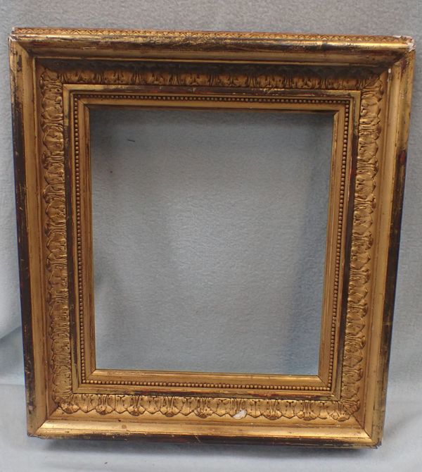 A 19TH CENTURY GILT GESSO FRAME