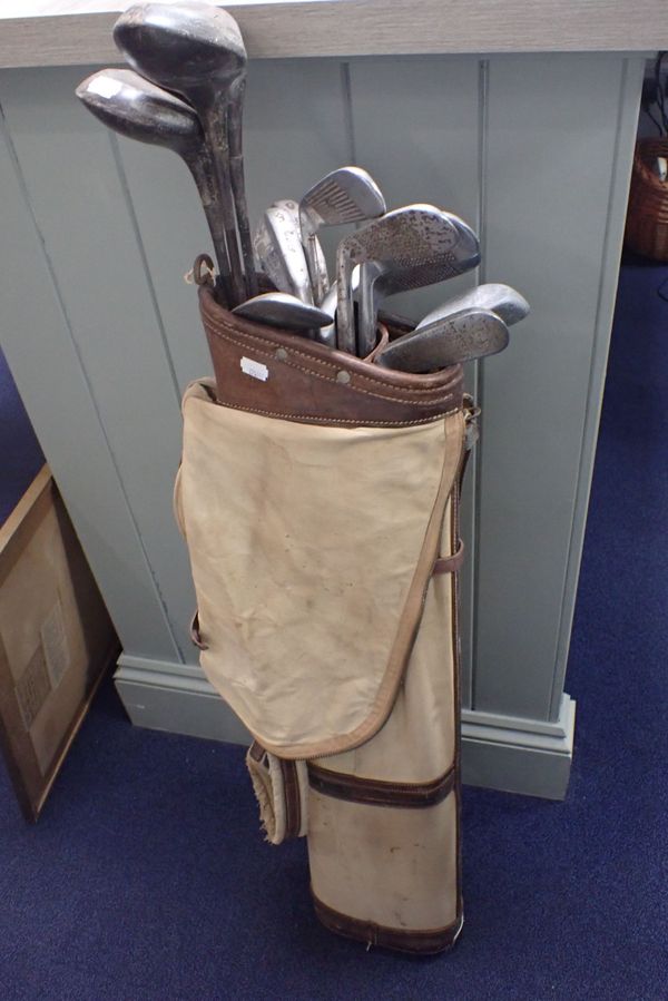 A SET OF VINTAGE GOLF CLUBS