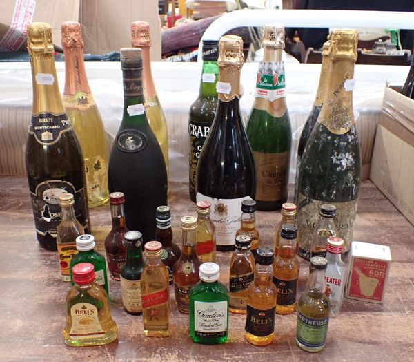THREE BOTTLES OF PROSECCO AND A COLLECTION OF MINIATURES