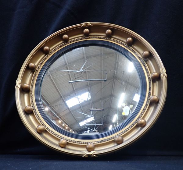 A REGENCY STYLE BALL-FRAMED CONVEX MIRROR