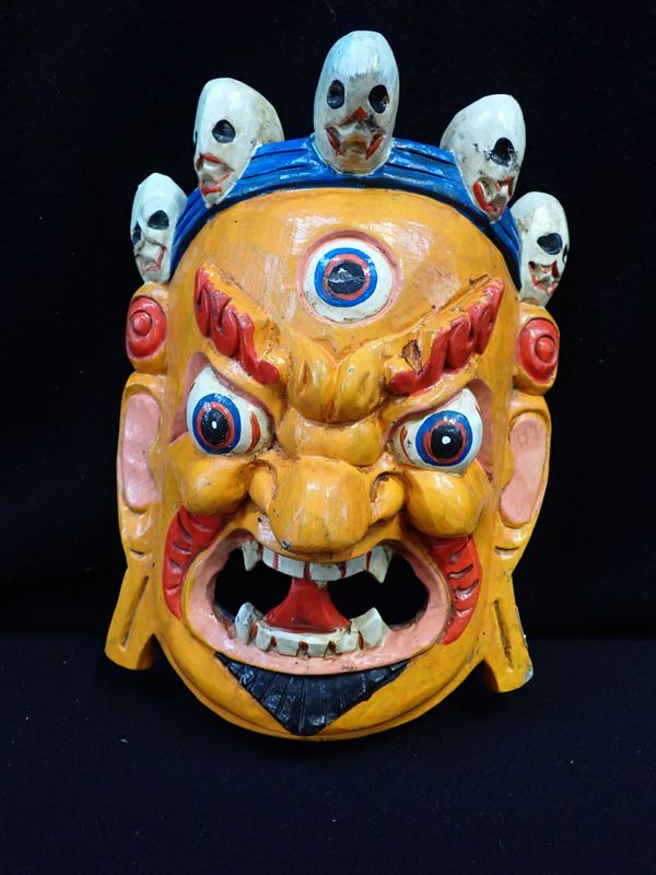 A YELLOW TIBETAN MASK