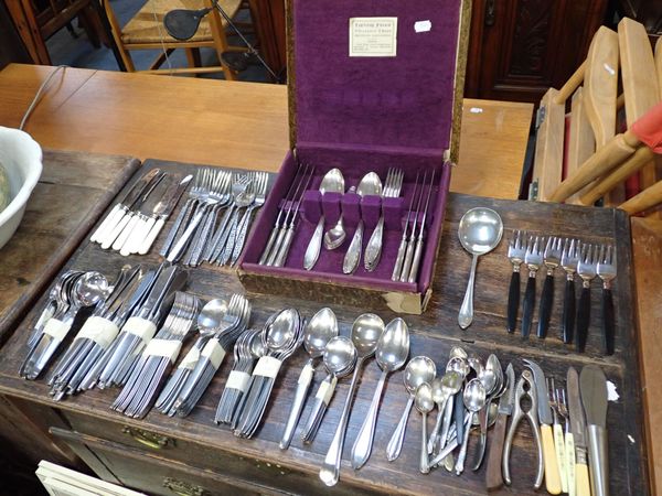 A COLLECTION OF STAINLESS STEEL AND PLATED CUTLERY