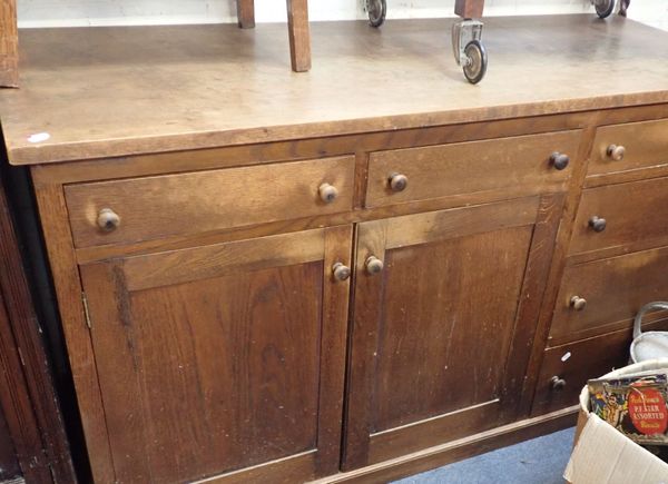 AN ARTS & CRAFTS STYLE OAK SIDEBOARD