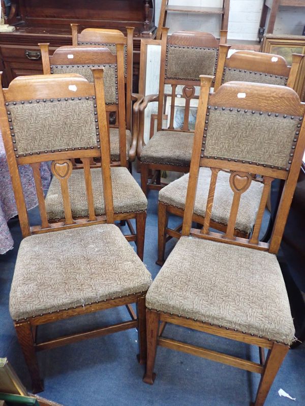 A SET OF SIX EDWARDIAN ARTS  & CRAFTS DINING CHAIRS