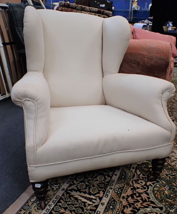 A VICTORIAN WING ARMCHAIR