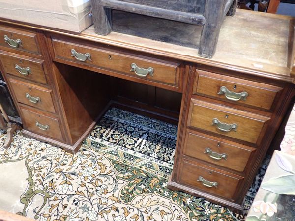 A LATE VICTORIAN PEDESTAL DESK