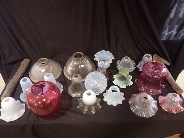 A LARGE QUANITY OF VARIOUS GLASS LAMP SHADES