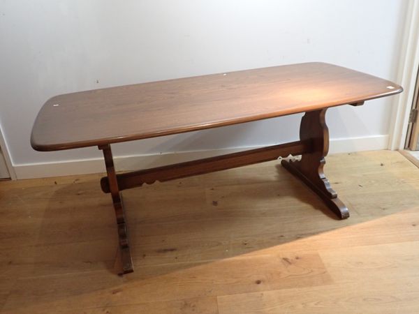 A MID CENTURY ERCOL DINING TABLE