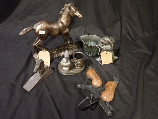 A CAST-METAL MODEL OF A HORSE