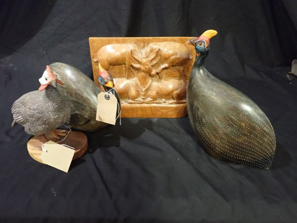 A CARVED LIMEWOOD MODEL OF A GUINEA FOWL