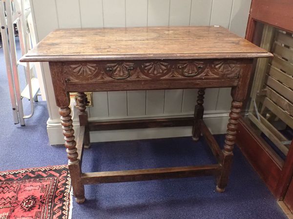 A 17TH CENTURY AND LATER OAK TABLE