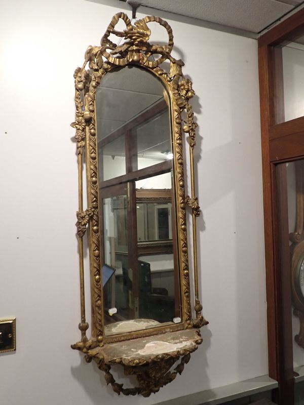 A 19TH CENTURY GILT COMPOSITION PIER MIRROR WITH SHELF