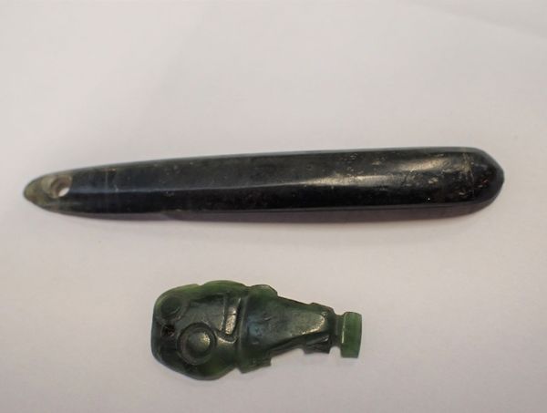 TWO NEW ZEALAND GREEN STONE PENDANTS, ONE IN THE FORM OF A TIKI