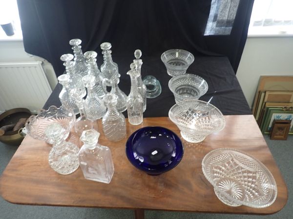 A COLLECTYION OF CUT GLASS DECANTERS