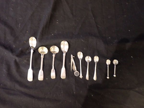 A COLLECTION OF SILVER CONDIMENT SPOONS