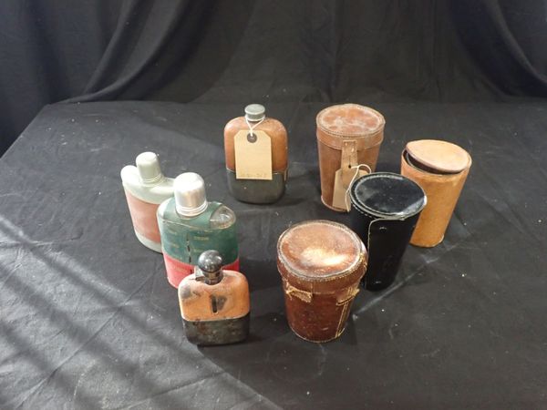 A SMALL GROUP OF HIP FLASKS AND LEATHER CASED CUPS