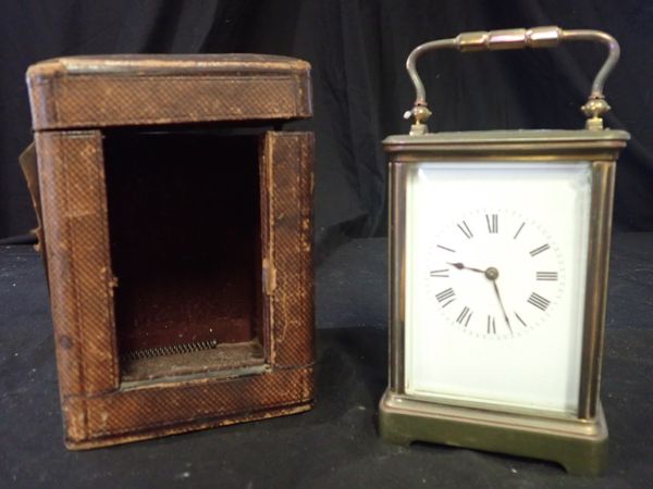 A FRENCH BRASS CASED STRIKING CARRIAGE CLOCK