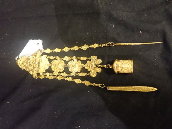 A 19TH CENTURY GILT CHATELAINE WITH ENGRAVED DECORATION