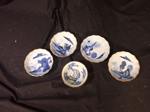 A SET OF FOUR CHINESE BLUE AND WHITE TEABOWLS