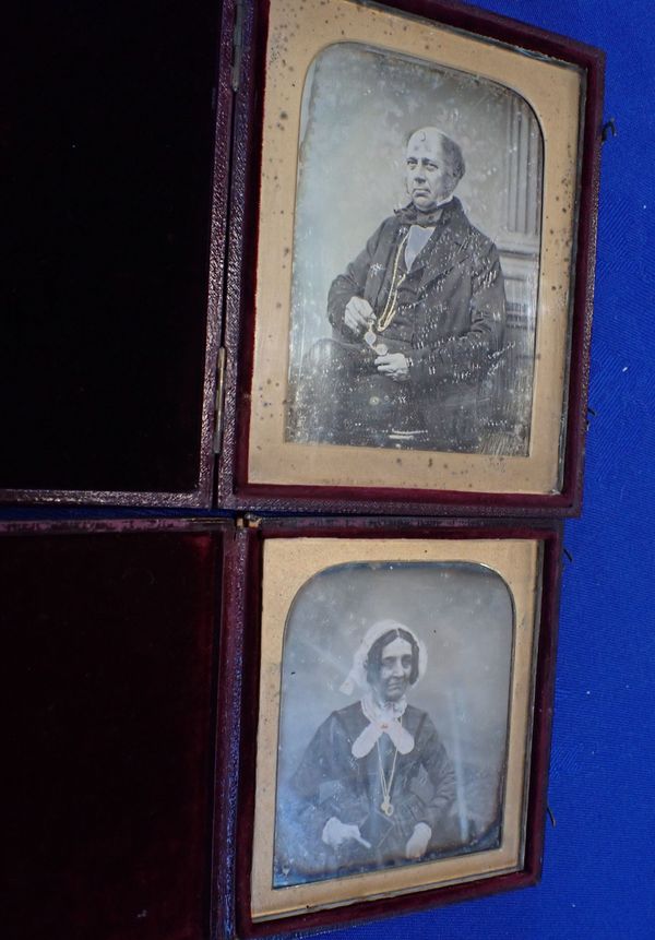 TWO 19TH CENTURY DAGUERREOTYPE PHOTOGRAPHS, A MAN, AND A WOMAN