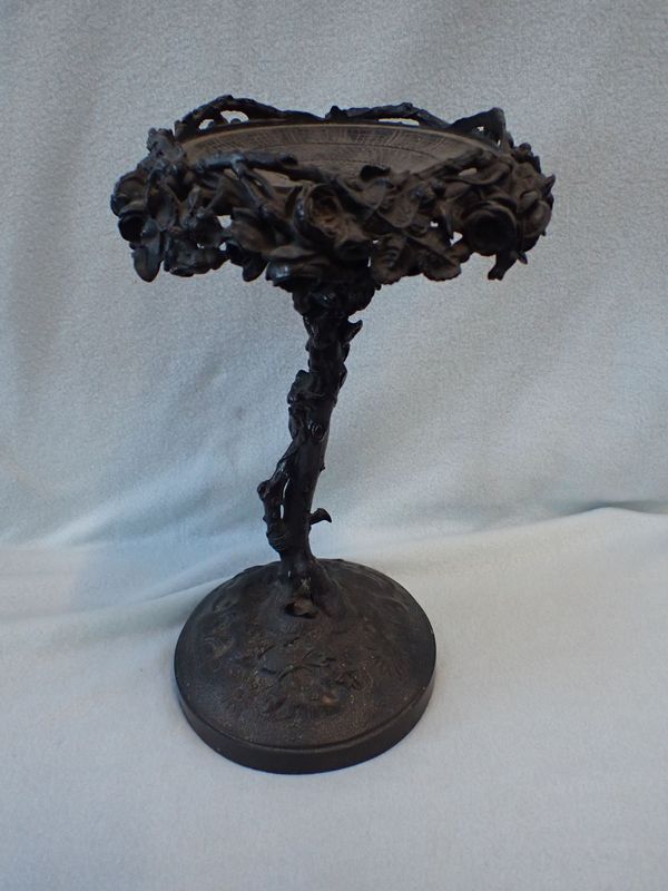 A BRONZE TABLE CENTREPIECE/STAND