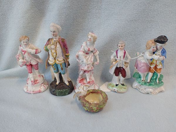 FIVE CONTINENTAL FIGURINES