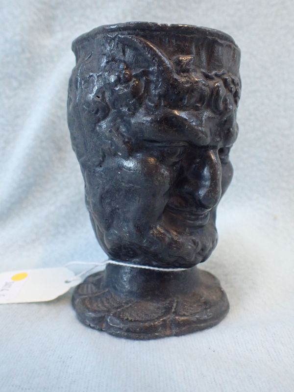 A 19TH CENTURY CAST LEAD 'BACCHUS' POT