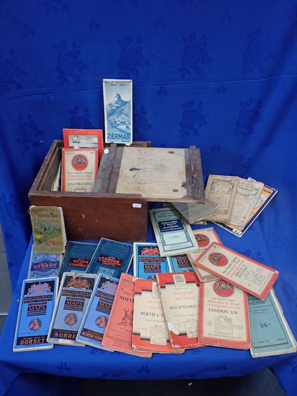 A COLLECTION OF VINTAGE MAPS IN A TIN LINED CRATE