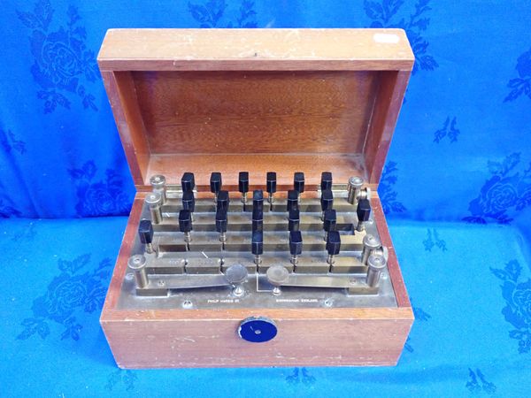 A  VINTAGE TEAK-CASED PHILIP HARRIS LTD. RESISTANCE BOX