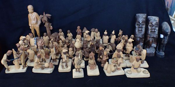 A COLLECTION OF WOODEN CARVED AFRICAN FIGURES