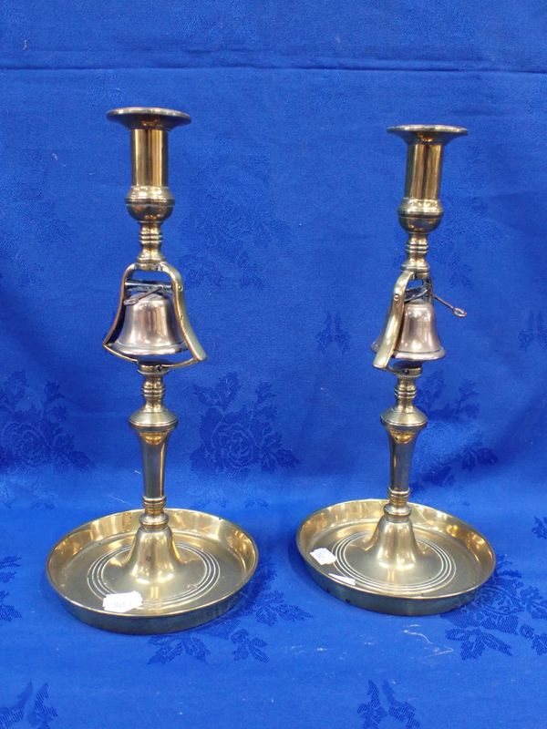 A PAIR OF 19TH CENTURY BRASS TAVERN CANDLESTICKS