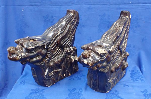 A PAIR OF CHINESE GLAZED POTTERY  TEMPLE LION ARCHITECTURAL ORNAMENTS