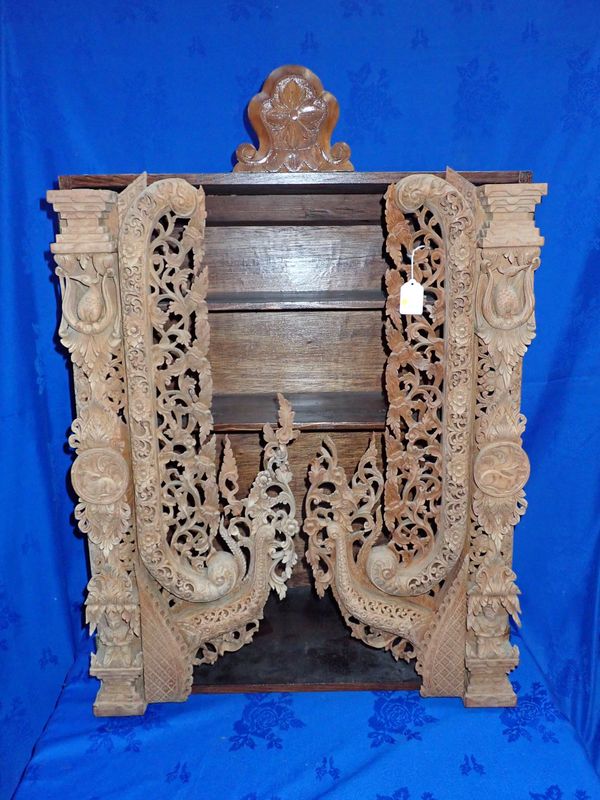 TWO  ORIENTAL CARVED WOODEN ELEMENTS, FITTED TO A MODERN CUPBOARD