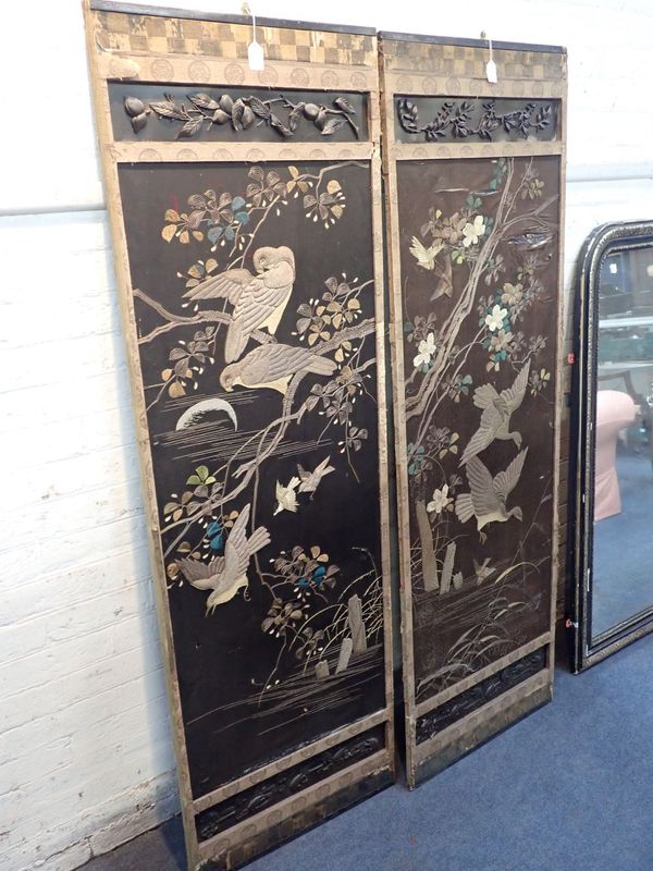 A PAIR OF ORIENTAL EMBROIDERED SCREEN PANELS