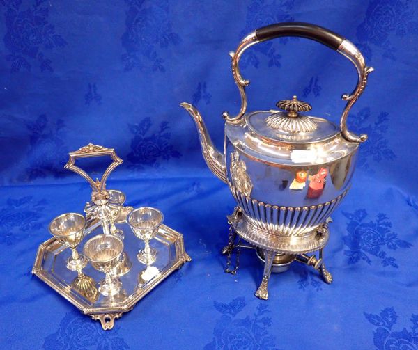 A SILVER-PLATED KETTLE ON STAND