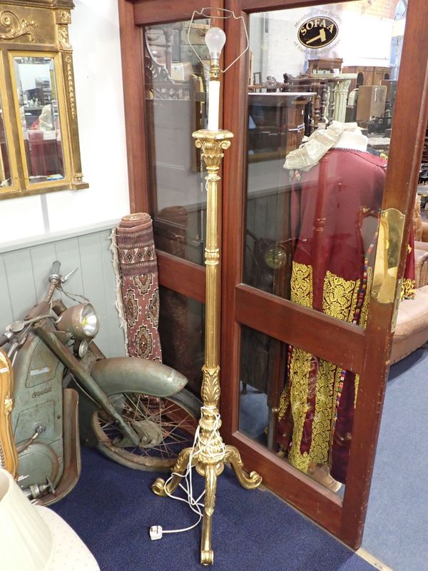 A GILT STANDARD LAMP