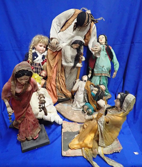 A COLLECTION  OF EASTERN DOLL FIGURES