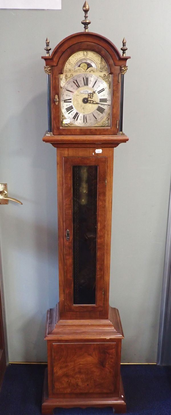 A WARMINK'S  WALNUT-CASED GRANDMOTHER CLOCK