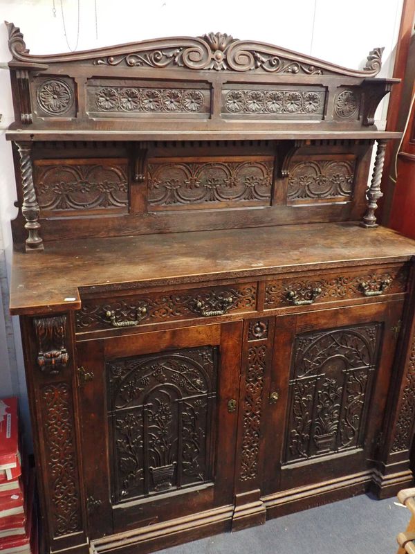 AN EARLY VICTORIAN ELIZABETHAN REVIVAL CHIFFONIER