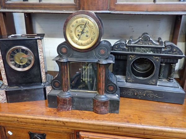 A MONUMENTAL FRENCH BLACK SLATE CLOCK WITH MERCURY PENDULUM