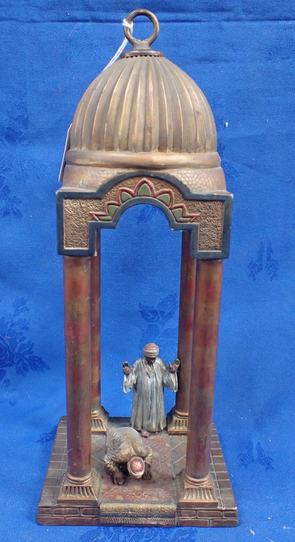 A SPELTER TABLEAU MOSQUE SCENE LAMP, THE LIGHT FITTING IN THE DOMED ROOF