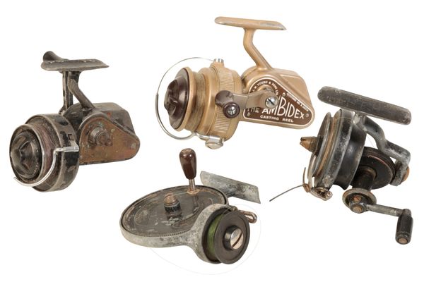 A GROUP OF FOUR FIXED SPOOL REELS